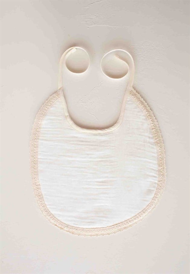 100109 - 013Bağlamalı Bebek Mama Önlüğü 25 cm Ekru - CigitCigitBağlamalı Ponponlu Mama Önlüğü 25 cm Ekru